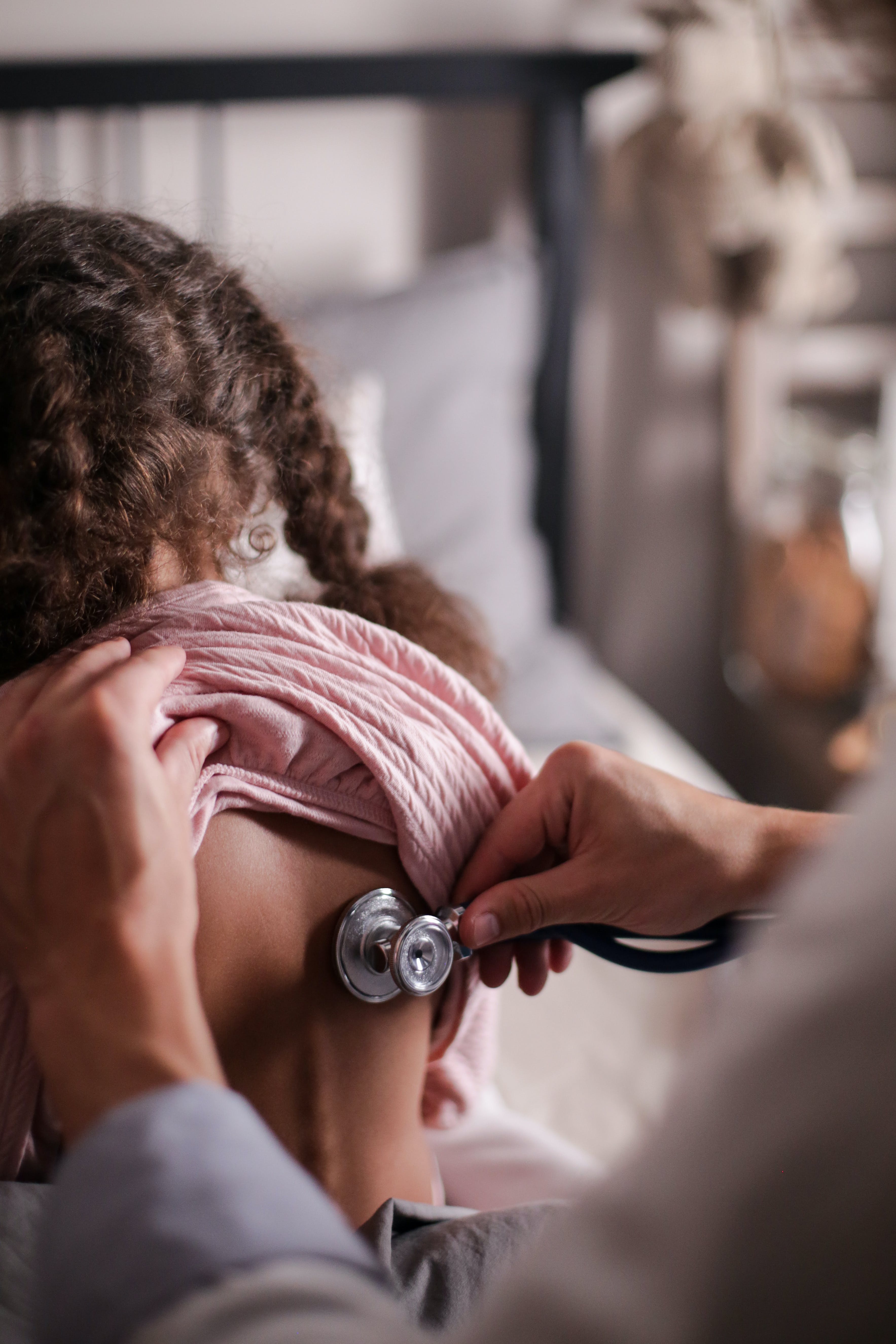 Stethoscope on child's back